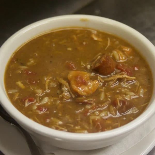 Close-up of a bowl of Sommer's Place Southern gumbo with shrimp, sausage, and rice.