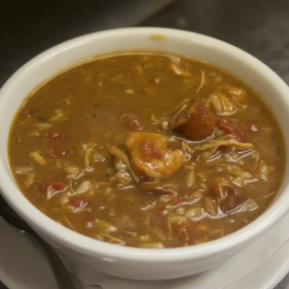 Close-up of a bowl of Sommer's Place Southern gumbo with shrimp, sausage, and rice.